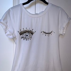 Form fitting t-shirt. NEVER WORN